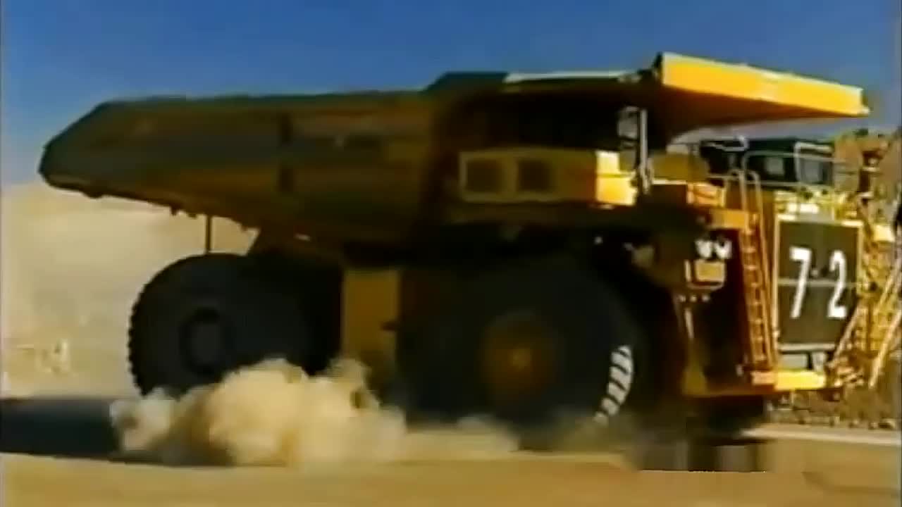 Huge Dump Truck Vs Car