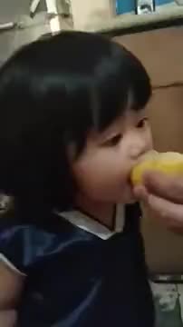 Kid Tries Lemon For The First Time