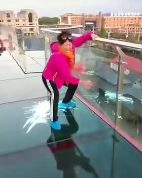 Woman Too Scared On A Glass Bridge