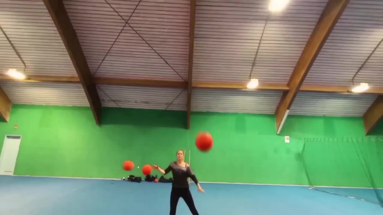 Duo Does Horizontal Juggling With Multiple Balls
