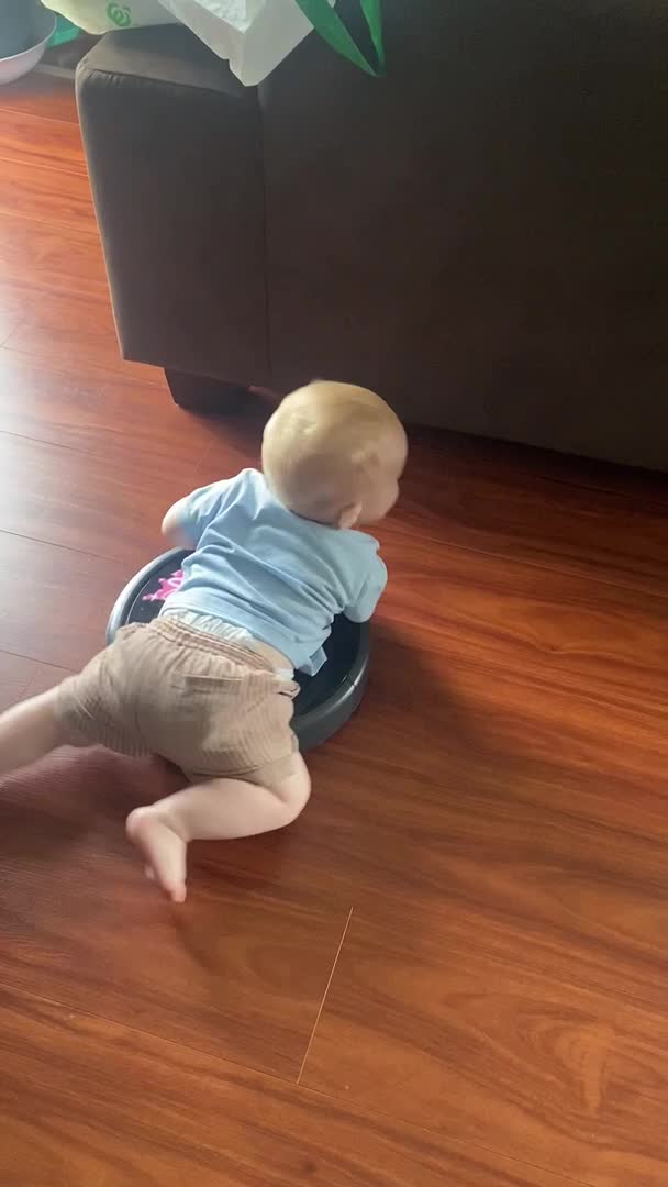 The Baby Loves Riding Our Roomba “Rhonda”