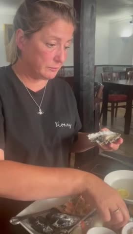 Woman Regrets To Eat A Plate Full Of Oysters