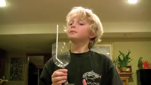 Kid Breaks a Glass