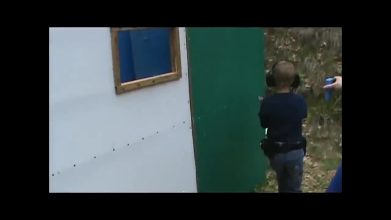 Little Boy Shoots with a Real Gun