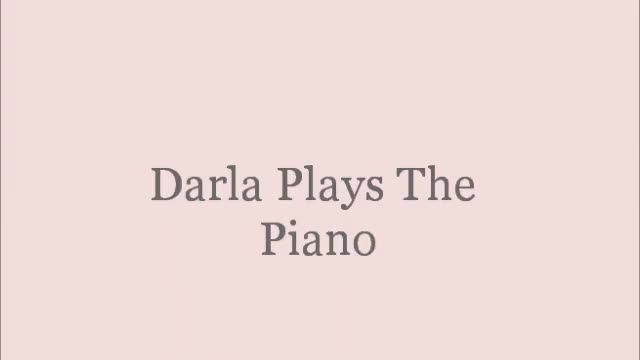 Darla Plays the Piano